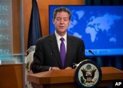 FILE - Ambassador-at-Large for International Religious Freedom Sam Brownback, speaks to reporters at the State Department in Washington, May 29, 2018.