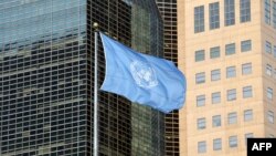 FILE - The United Nations flag is seen at the United Nations General Assembly Hall in New York City, Sept. 23, 2019.