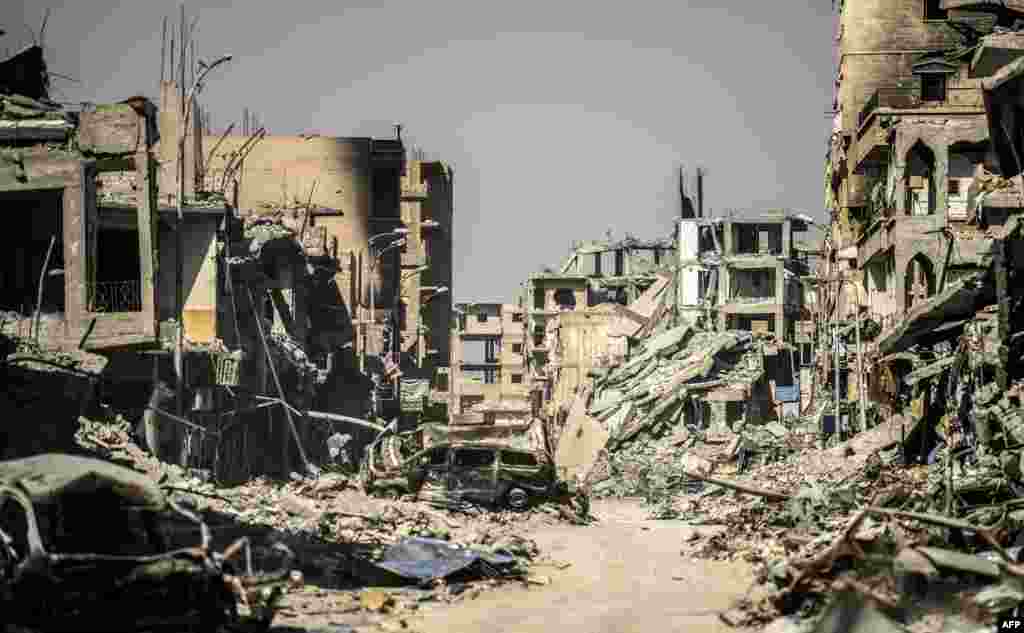 A general view of heavily damaged buildings in Raqqa, after a Kurdish-led force expelled the Islamic State group from the northern Syrian city, Oct. 21, 2017.