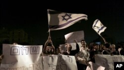 以色列人在南部城市基亚特.玛拉基抗议停火
