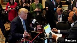 U.S. President Donald Trump answers a question during a radio interview on tax reform at the White House in Washington, Oct. 17, 2017.