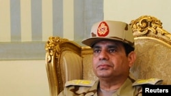 Egypt's Defense Minister Abdel Fattah al-Sisi is seen during a news conference in Cairo, May 22, 2013. 