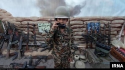 This photo posted on Iran's state-run news agency site IRNA purportedly shows a child being trained to fire weapons at Iran’s perceived Western enemies.