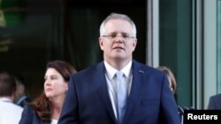 Treasurer of Australia Scott Morrison, arriving for a party meeting, became the country's new prime minister, in Canberra, Australia, Aug. 24, 2018.