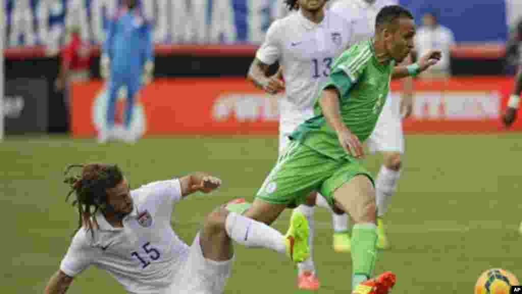 Nigeria's Peter Odemwingie gets control of the ball away from United States's Kyle Beckerman.