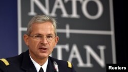 General Denis Mercier, Supreme Allied Commander, Transformation talks during a news conference after the 177th Military Committee in Chiefs of Defense Session in Brussels, Belgium, May 17, 2017.