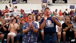 Supporters of Republican presidential candidate Donald Trump cheer during his campaign stop at Windham High School in Windham, N.H., Aug. 6, 2016. 