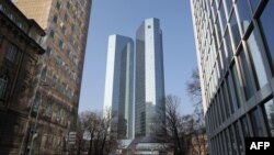 FILE - The towers of the German company Deutsche Bank are pictured in Frankfurt, western Germany.