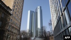 FILE - The towers of the German company Deutsche Bank are pictured in Frankfurt, western Germany, Feb. 15, 2017.