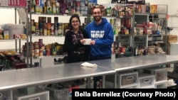 David Joffee from Nourish Now poses with Bella Berrellez. Nourish Now is a nonprofit organization that collects food from donors like restaurants and cafeterias and distributes it to families in need. 
