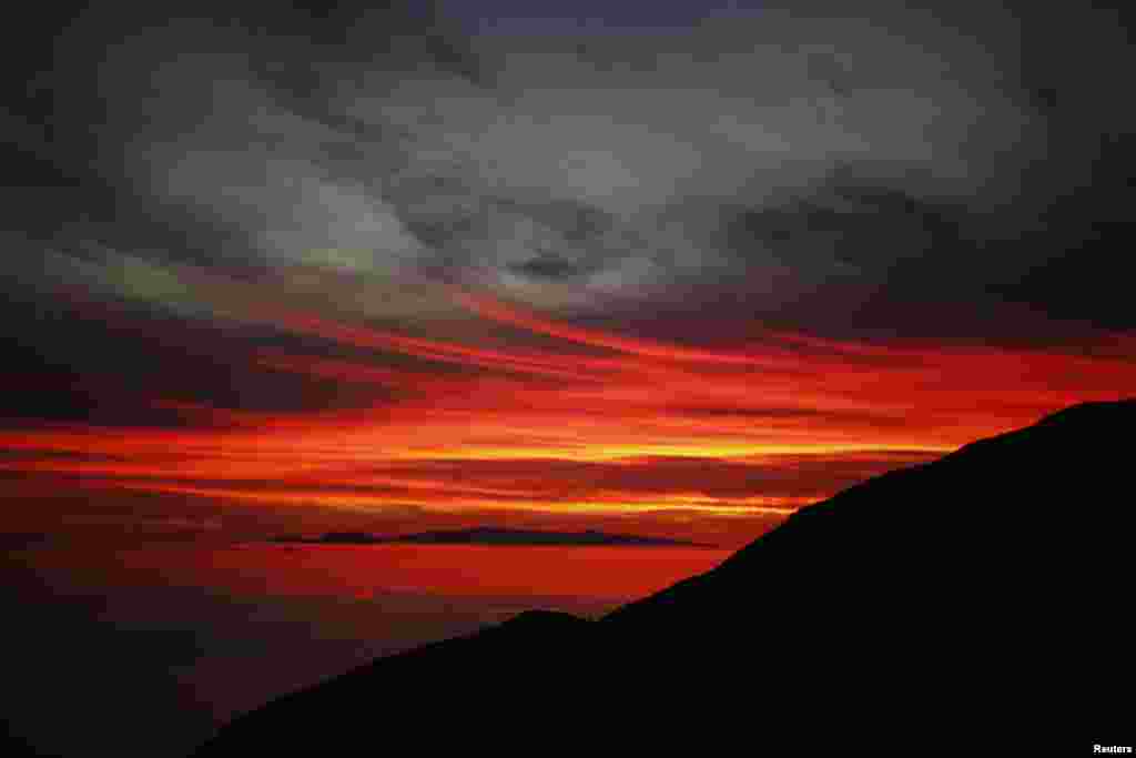 The sun sets over the Pacific Ocean in Point Mugu State Park, California, March 14, 2015.