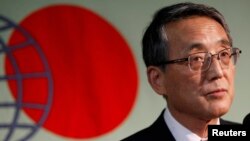 FILE - Japan's Nuclear Regulation Authority Chairman Shunichi Tanaka attends a news conference in Tokyo, September 2012.