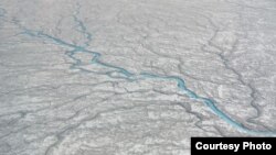 A vast network of previously little-understood rivers and streams that flow on the ice sheet into the ocean could be a major factor contributing to rising sea levels. (UCLA/Lawrence C. Smith)