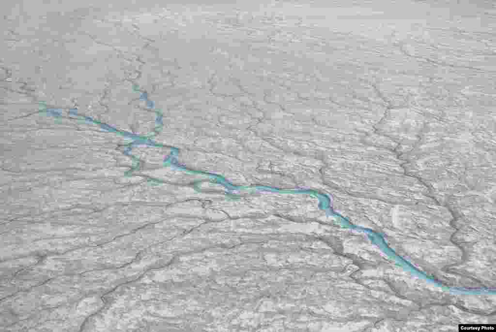 The UCLA-led study finds that a vast network of previously little-understood rivers and streams that flow on the ice sheet into the ocean could be a major factor contributing to rising sea levels. (UCLA/Laurence C. Smith)