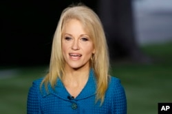 FILE - Kellyanne Conway, senior adviser to President Donald Trump, speaks during an interview outside the White House, in Washington, May 10, 2017. The White House Wednesday posted on its website ethics waivers granted to four ex-lobbyists and numerous ot