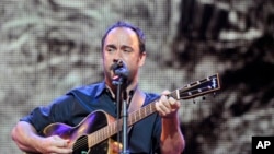 FILE - Dave Matthews performs during the Farm Aid 2013 concert at Saratoga Performing Arts Center in Saratoga Springs, N.Y.