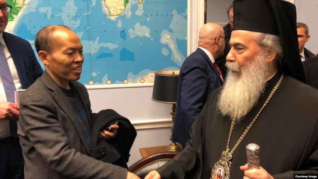 李柏光今年2月7号在美议员办公室会见来自耶路撒冷的东正教大主教
