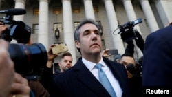 FILE - U.S. President Donald Trump's former lawyer Michael Cohen leaves Federal Court after entering a guilty plea in New York, Nov. 29, 2018. 