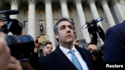 FILE - U.S. President Donald Trump's former lawyer Michael Cohen exits Federal Court in Manhattan, New York City, Nov. 29, 2018. 