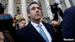 U.S. President Donald Trump's former lawyer Michael Cohen exits Federal Court after entering a guilty plea in Manhattan, New York City, Nov. 29, 2018. 