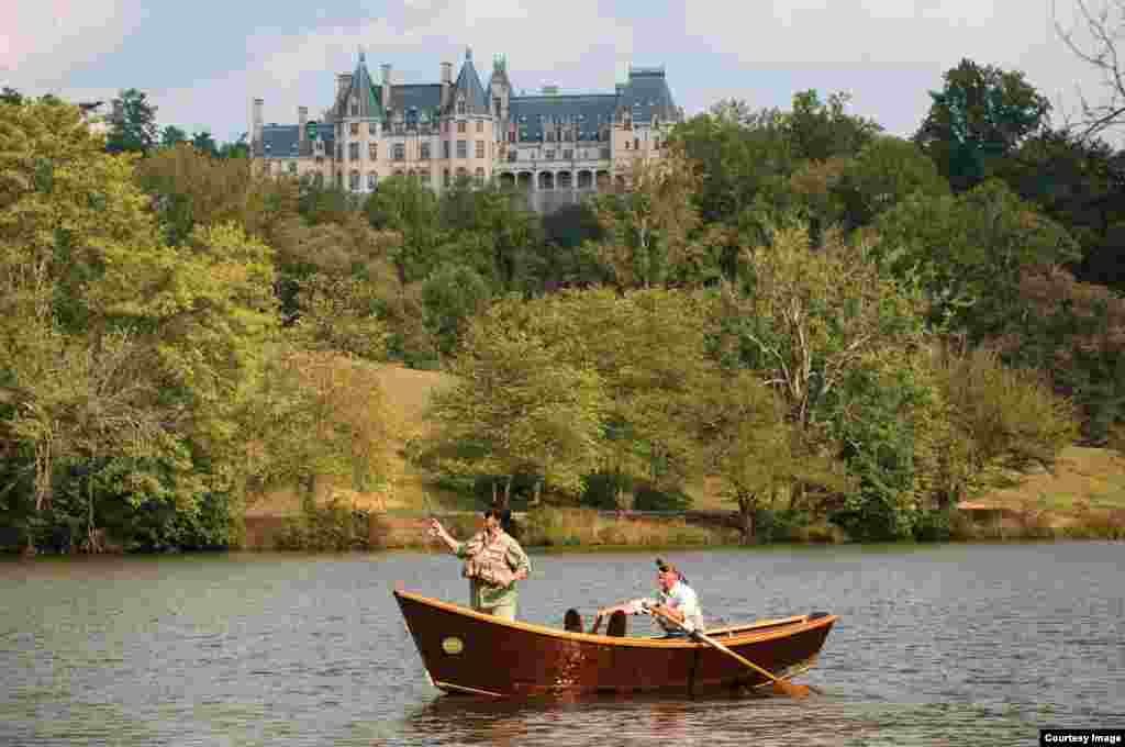 Visitors fly fishing on the grounds of Biltmore.