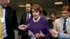 FILE - In this June 3, 2014 file photo, Senate Intelligence Chair Sen. Dianne Feinstein, D-Calif. is pursued by reporters on Capitol Hill in Washington.