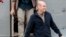 FILE - In this April 20, 2014 file photo, released French hostage Nicolas Henin arrives at the Villacoublay military airbase, outside Paris. He was released with other French journalists who had been held since June 2013.