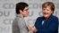 Annegret Kramp-Karrenbauer ve Angela Merkel