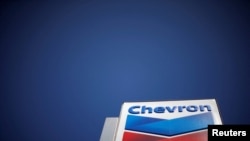 FILE PHOTO: Dow Jones Industrial Average listed company Chevron (CVX)'s logo is seen in Los Angeles