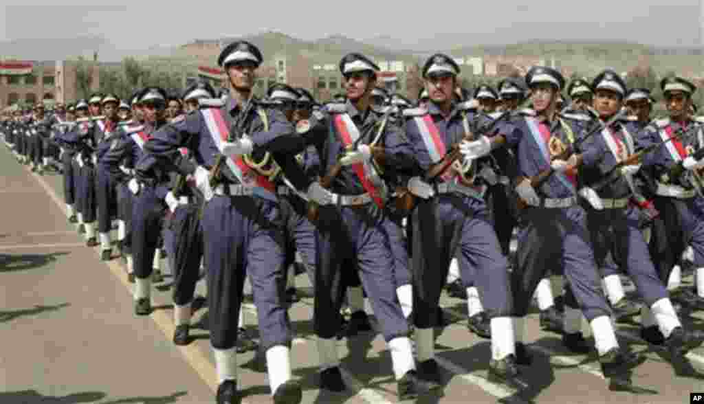 FILE - In this Aug. 19, 2009, file photo, Yemenite army cadets marching during a graduation ceremony in San'a, Yemen. The terror incubator in Yemen, birthplace of the Christmas Day airliner attack, is forcing the United States and allies to pour millions 