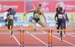 FILE - South Africa's Wenda Nel runs the 400m hurdles during the Confederation of African Athletics (CAA) Championships held in Durban, June 26, 2016.