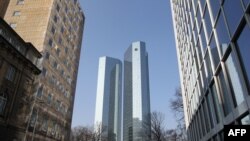 FILE - The towers of the German company Deutsche Bank are pictured in Frankfurt, western Germany.