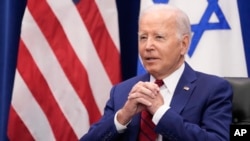 FILE - U.S. President Joe Biden listens during a meeting with Israeli Prime Minister Benjamin Netanyahu in New York, Sept. 20, 2023.