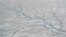 A vast network of previously little-understood rivers and streams that flow on the ice sheet into the ocean could be a major factor contributing to rising sea levels. (UCLA/Lawrence C. Smith)