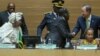 UN Secretary General, Ban Ki-moon, right, shakes hands with Zimbabwean president, Robert Mugabe, middle, as African Union Commission Chairperson Nkosazana Dlamini Zumaduring, left, watch the opening ceremony of the 26 ordinary of the African Union Summit in Ethiopian capital Addis Ababa, Saturday, Jan. 30, 2016. (AP Photo/Mulugeta Ayene)