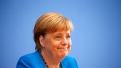 Kancelarja gjermane, Angela Merkel në konferencën e përvitshme për shtyp të verës, të premten më 28 gusht.