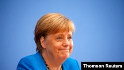 앙겔라 메르켈 독일 총리가 28일 베를린에서 열린 연례 하계 기자회견에서 발언하고 있다. 