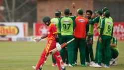 FILE: Zimbabwean batsman Tadiwanashe Marumani walks off the pitch after been dismissed during the final cricket T20 match against Pakistan at Harare Sports Club, Sunday, April, 25, 2021.(AP Photo/Tsvangirayi Mukwazhi)