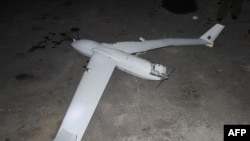 This undated representation   released from North Korea's authoritative  Korean Central News Agency via KNS connected  Oct. 19, 2024, shows what is claimed to beryllium  a recovered South Korean drone, astatine  an undisclosed determination  successful  North Korea.