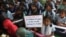 Indian school children participate in a rally to mark World Toilet Day in Hyderabad, India, Nov.19, 2014.