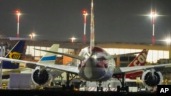 American Airlines flight AA292 en route from New York to New Delhi that turned around over the Caspian Sea, Feb. 23, 2025, sits on the tamarack of Rome's Leonardo da Vinci International airport, Italy.