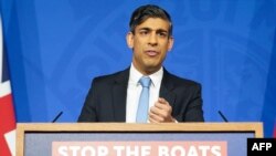 FILE - Britain's Prime Minister Rishi Sunak hosts a press conference inside the Downing Street Briefing Room, in central London on January 18, 2024, following the passing of the government's Rwanda Bill in the House of Commons.