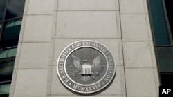 FILE - U.S. Securities and Exchange Commission building in Washington.