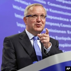 European Commissioner for Economic and Monetary Affairs Olli Rehn speaks during a media conference at EU headquarters in Brussels on Aug. 5, 2011