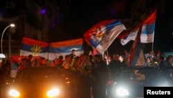 Pristalice Jakova Milatovića slave u Podgorici njegovu pobjedu (Foto: REUTERS/Stevo Vasiljevic)