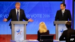 Republican presidential candidate, businessman Donald Trump answers a question as Republican presidential candidate, Senator Ted Cruz of Texas listens during a Republican presidential primary debate on Feb. 6. Candidates are talking often about their religious beliefs. (AP Photo/David Goldman)