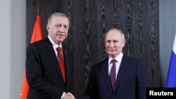 Президент Туреччини Ердоган та президент Росії Путін під час зустрічі у Самарканді