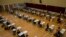 Students wearing masks to help stop the spread of the new coronavirus, sit for the Diploma of Secondary Education (DSE) exams at a school in Hong Kong, April 24, 2020. 