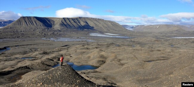 General view shows fossil-bearing rocks, where the 250 million year-old fossils of the earliest-known ichthyosaur, a type of marine reptile that flourished during the age of dinosaurs, where found, in the remote Arctic island of Spitsbergen, Norway, in this undated handout image obtained by Reuters on March 14, 2023. (Benjamin Kear/Handout via REUTERS)