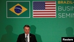 El presidente brasileño Jair Bolsonaro habla durante el Seminario de Relaciones Comerciales Brasil-Estados Unidos, en Miami, Florida, Estados Unidos. 9 de marzo de 2020.